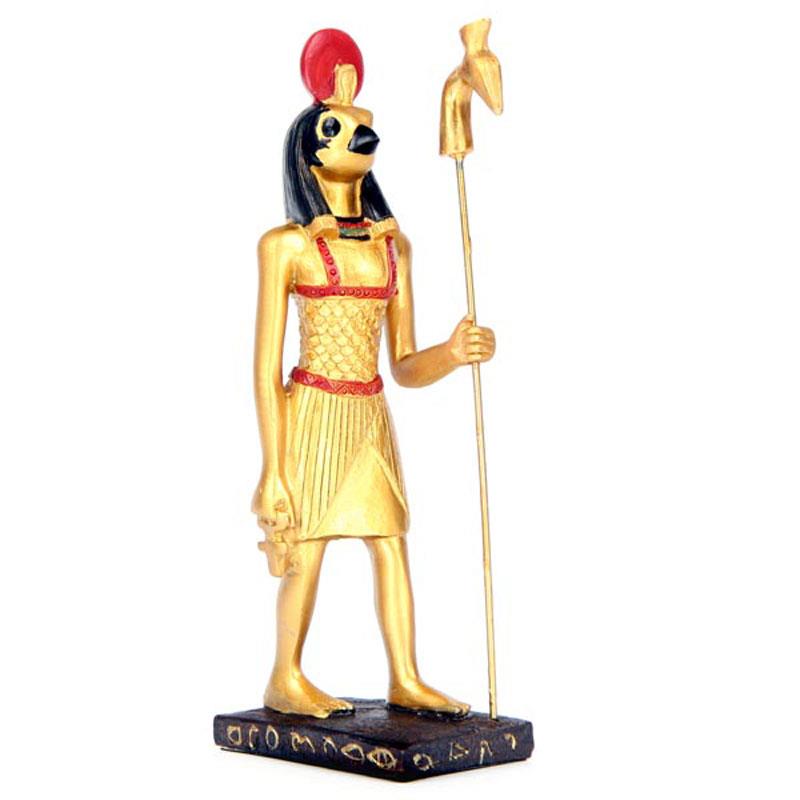 Arving spids Cater Egyptisk Gud Horus med kors og stav guldfarvet polyresin h15cm
